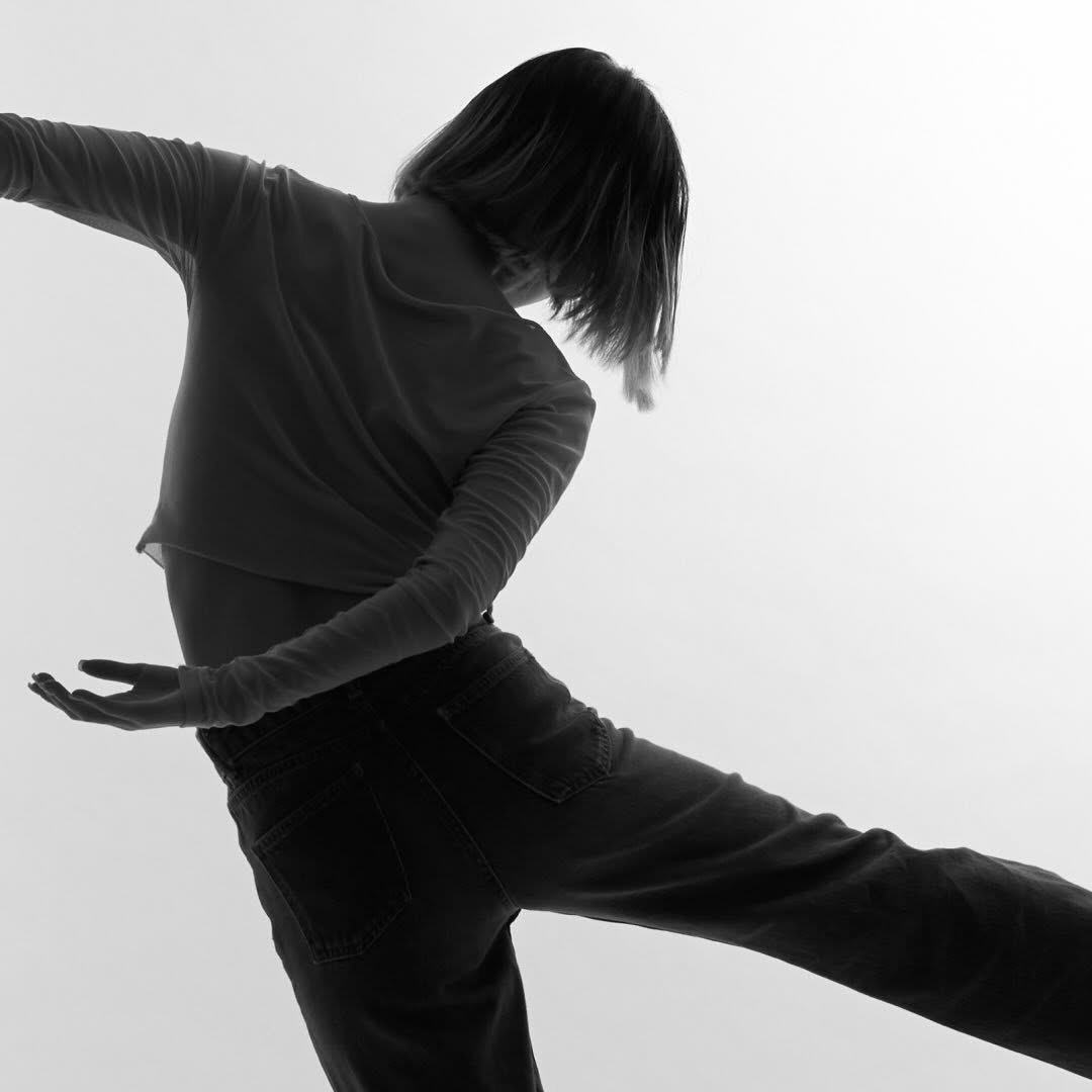 Nanaho mid-movement, black and white